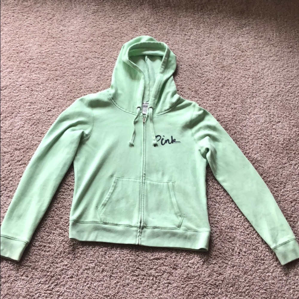 Pink brand green zip up hoodie.